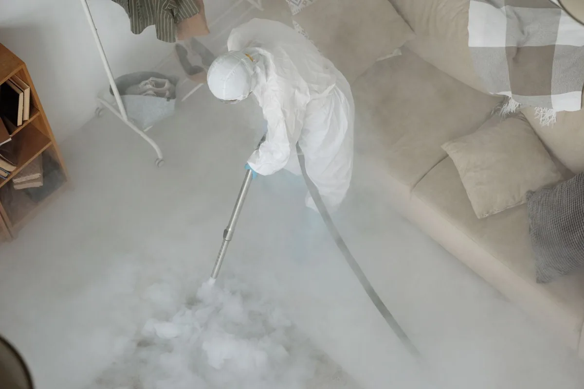 Biohazard cleanup technician in protective equipment, Florala, AL